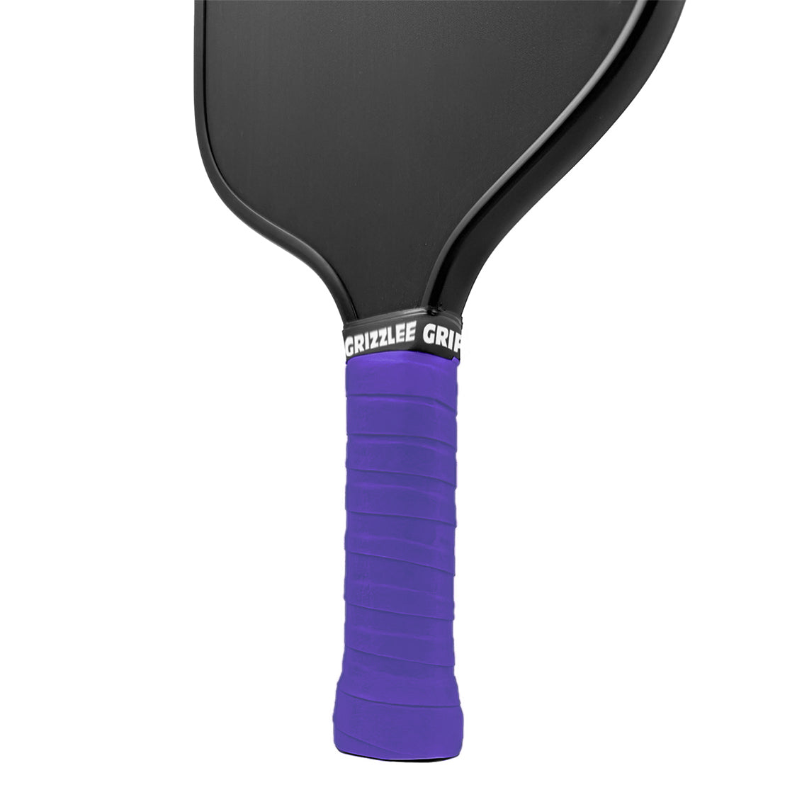 Close-up of a purple pickleball paddle grip with 'GRIZZLEE' branding on a gray background