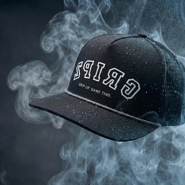 Black cap with white text on a dark background with smoke effects