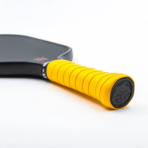 Installing Grizzlee Gripz Bright Yellow Pro Tour Grips on a Pickleball Paddle. Grips are comfortable and highly used by athletes all over the globe

