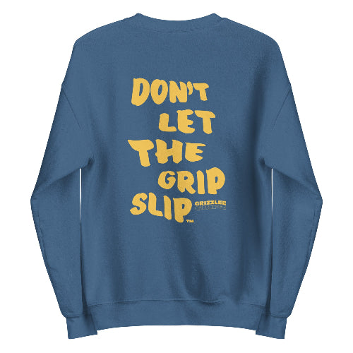 yellow dripping font on a crewneck sweatshirt that is indigo blue
